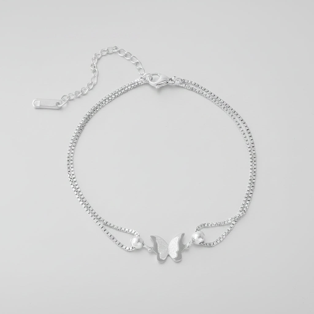 Gold ankle bracelet with butterfly pendant – stainless steel plated with 18-karat gold, perfect for everyday wear