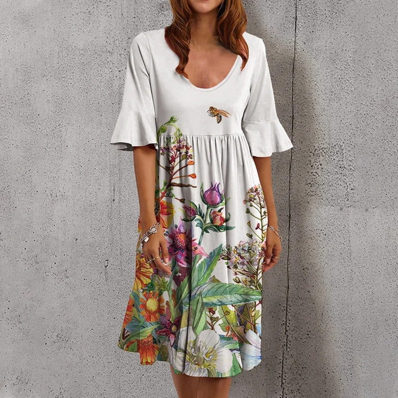 Multicolored women's dress with floral print and half sleeves
