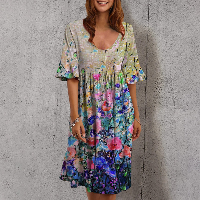 Multicolored women's dress with floral print and half sleeves