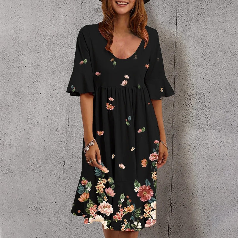 Multicolored women's dress with floral print and half sleeves