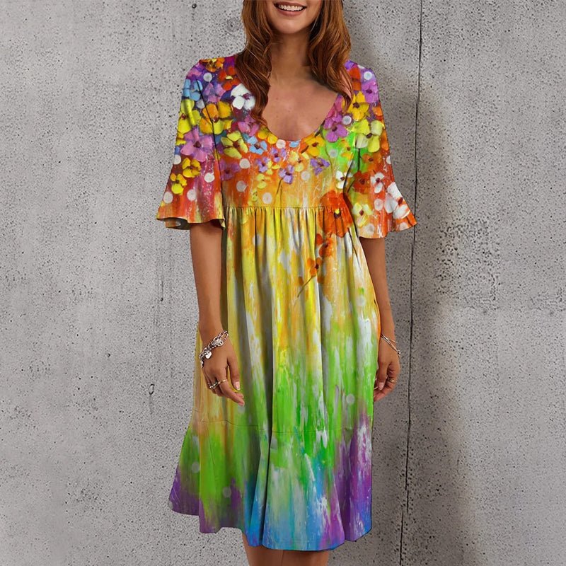 Multicolored women's dress with floral print and half sleeves