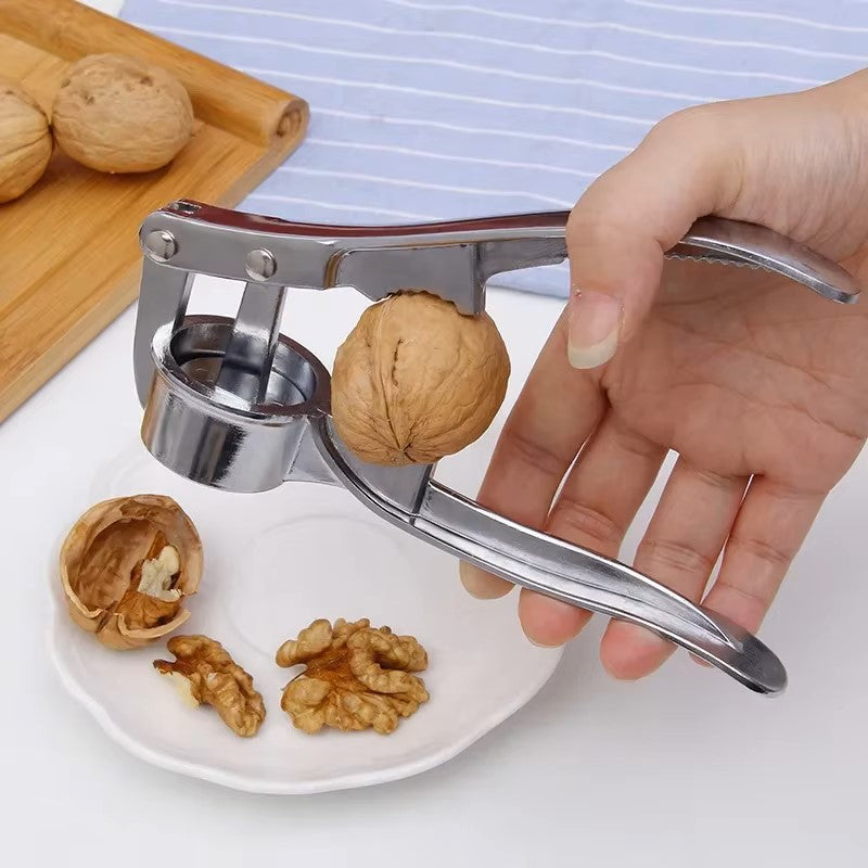 Robust garlic press made of stainless steel