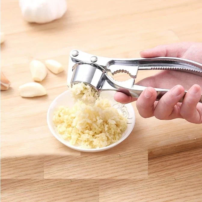 Robust garlic press made of stainless steel