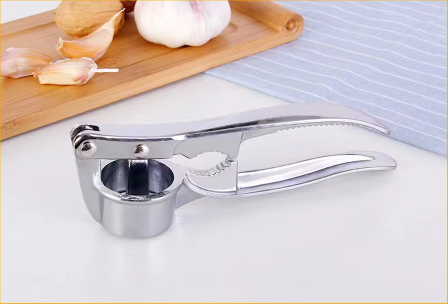 Robust garlic press made of stainless steel