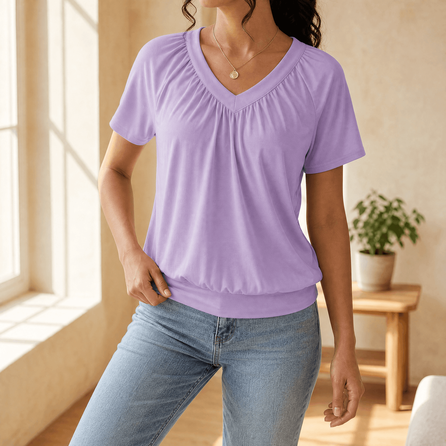 Women's pleated V-neck blouson top
